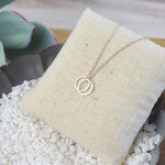 Double Karma Pendant Necklace